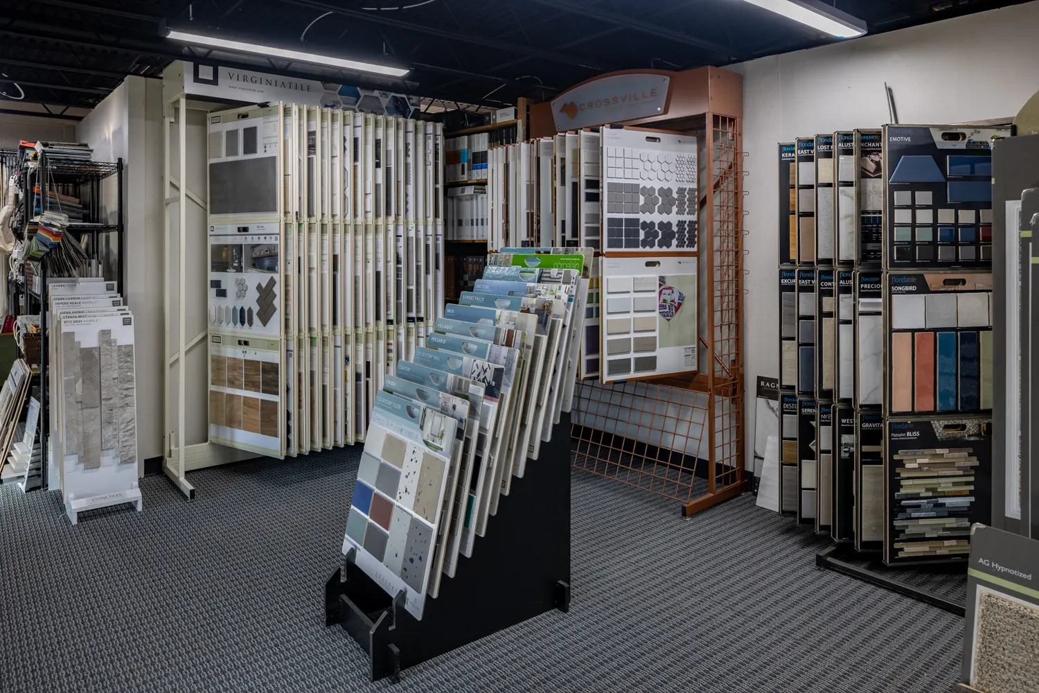 Tile and stone sample displays in the O’Leary Interiors showroom